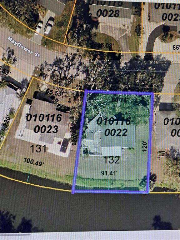 This is a satellite map view showing a residential property lot outlined in blue — 3372 MAYFLOWER STREET, SARASOTA, FL