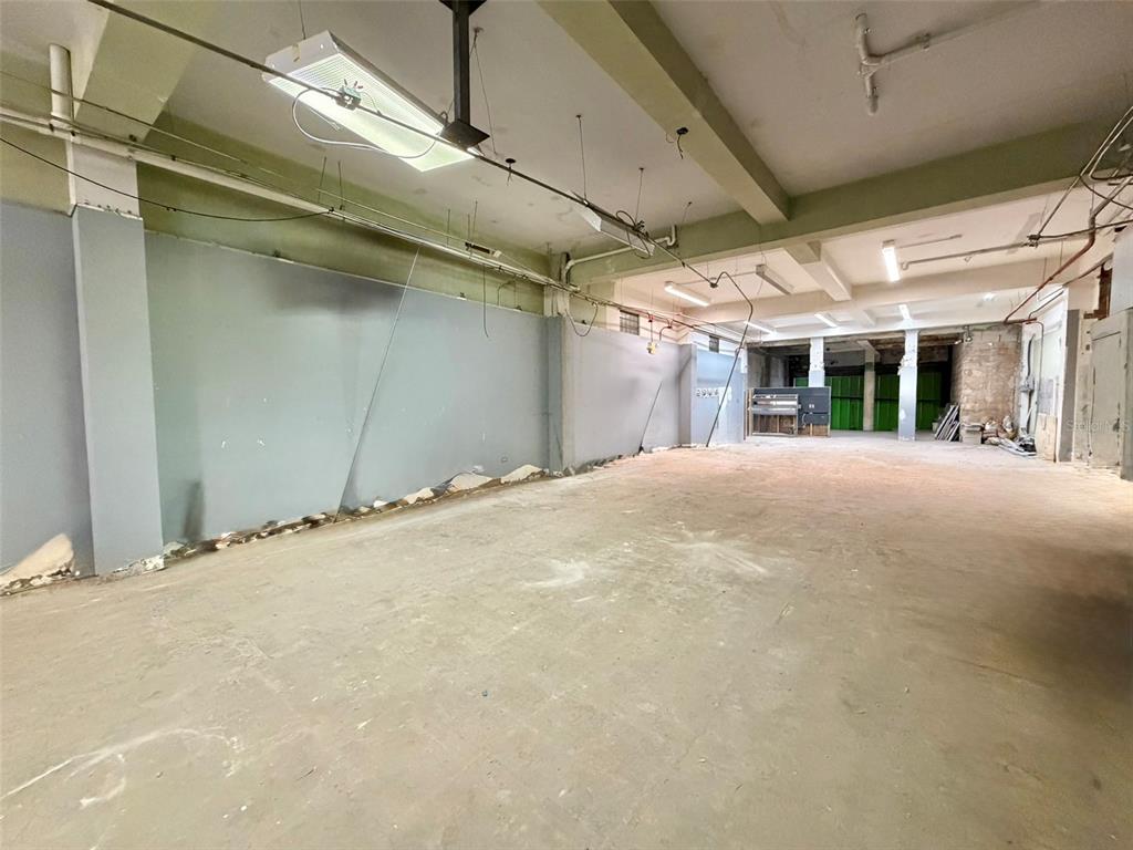 An unfinished commercial space with exposed concrete ceilings, gray walls, and concrete flooring — 1204 PONCE DE LEON AVENUE UNIT LOCAL B, SAN JUAN, PR