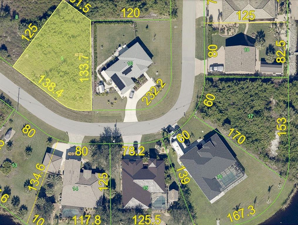 This aerial map shows residential lots with property boundary lines and dimensions — 9399 PANAMA CIRCLE, PORT CHARLOTTE, FL