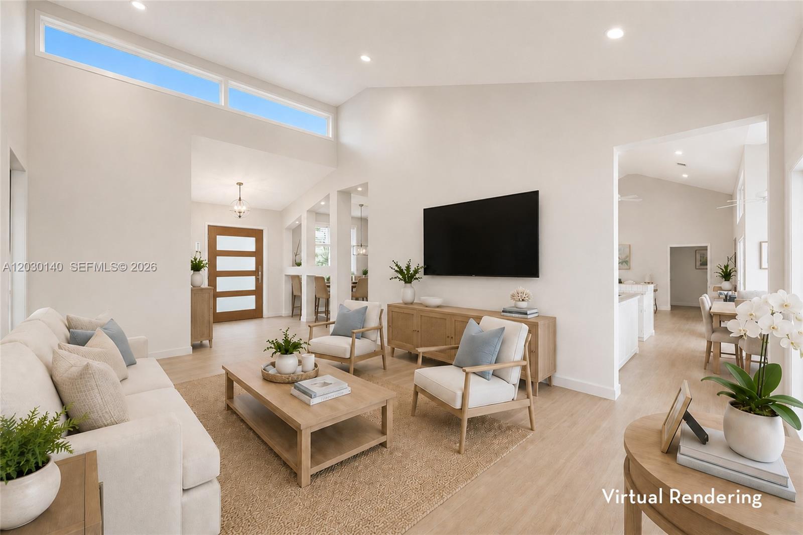 This virtual rendering shows a bright, modern living room with vaulted ceilings and light wood floors — 10290 SE Banyan Way, Jupiter FL 33469, JUPITER, FL