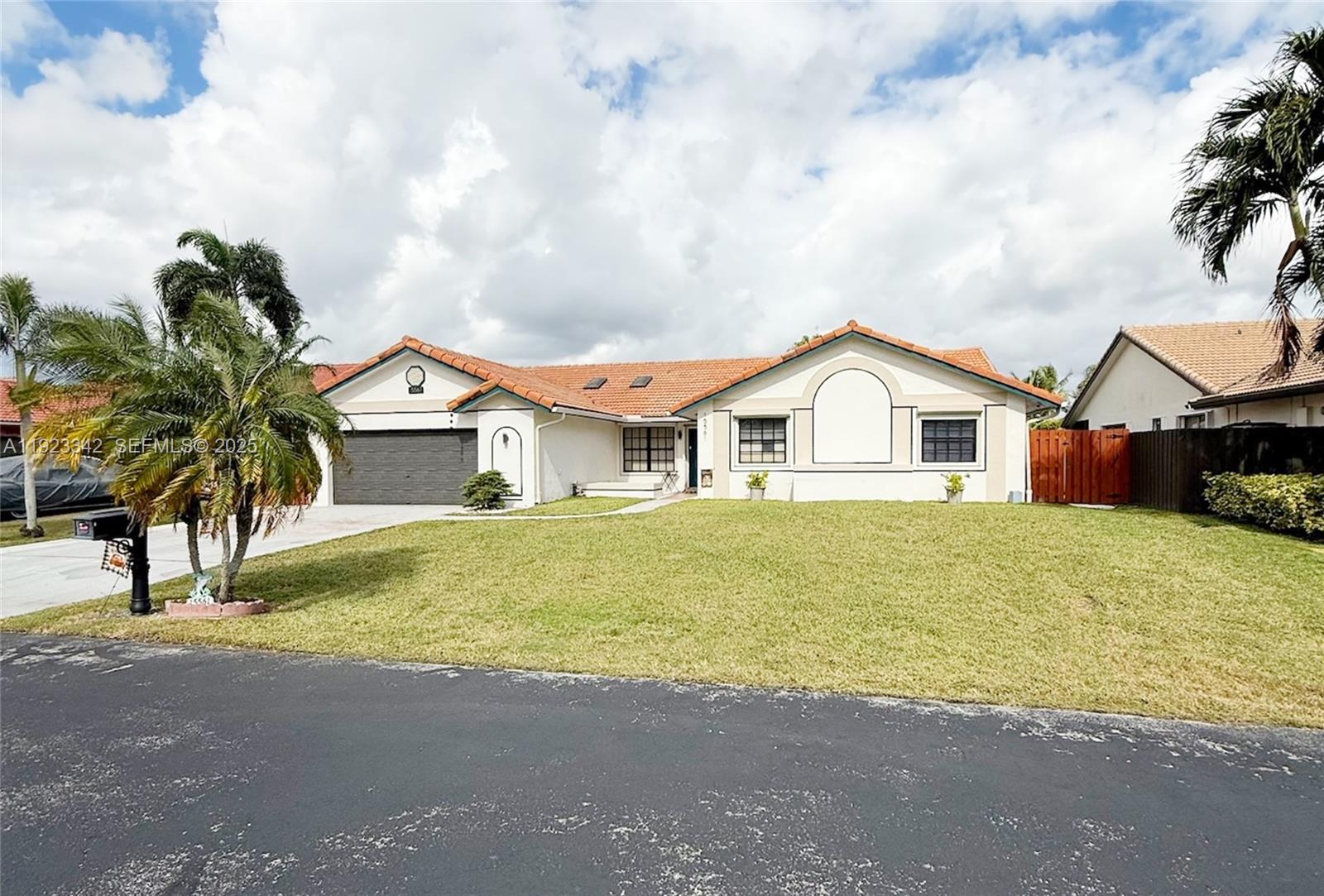 15561 Carriage Ct, Davie FL 33331