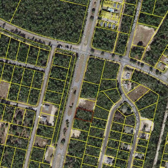 This is an aerial map showing a vacant residential lot outlined in red — 00 MARION OAKS BOULEVARD, OCALA, FL