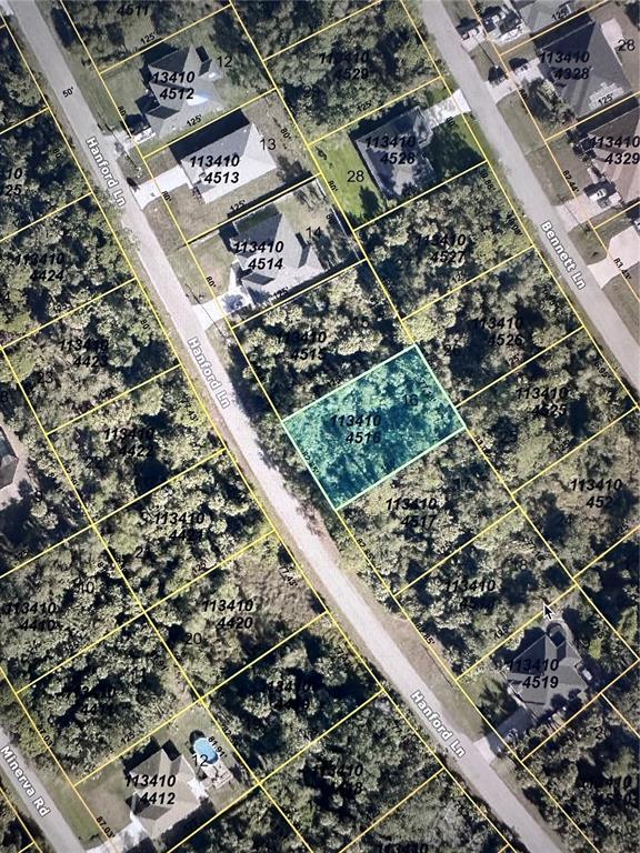 This is an aerial map showing a vacant residential lot highlighted in a neighborhood — HANFORD LANE, NORTH PORT, FL