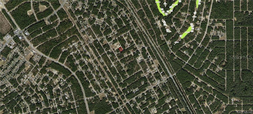 This is an aerial map view of a residential area with a highlighted property — 941 W CADIMA PLACE, CITRUS SPRINGS, FL