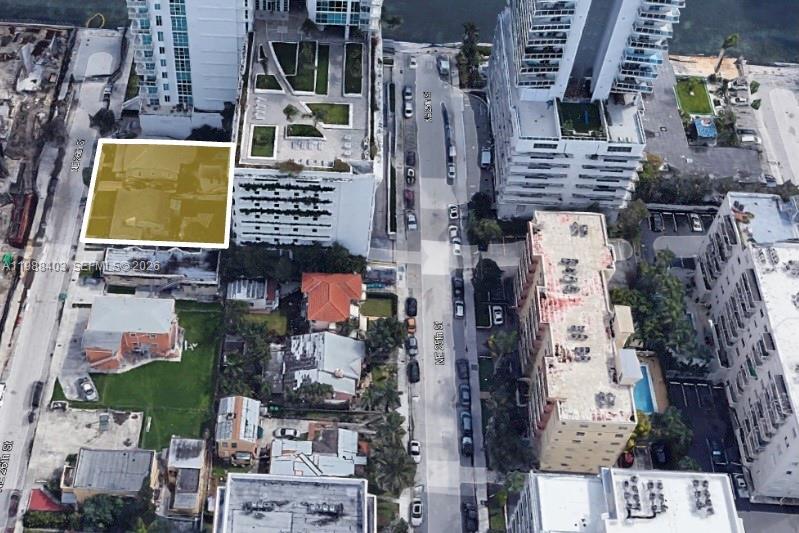 An aerial view shows a highlighted residential property lot surrounded by high-rise apartment buildings — 702-708 NE 26th St, Miami FL 33137, MIAMI, FL