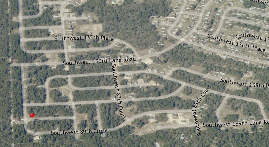 This is an aerial map view of a residential neighborhood with a highlighted property lot — 0 SW 139 STREET, OCALA, FL