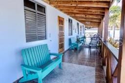 A covered outdoor porch features a turquoise wooden bench, tiled flooring, and multiple doorways — B-13 CARR 3301 KM HM 1.9 INT STREET UNIT B-13, CABO ROJO, PR