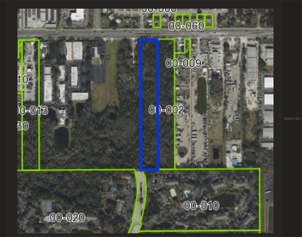 This is an aerial map showing a rectangular parcel of land highlighted in blue — 5912 HOFFNER AVENUE, ORLANDO, FL