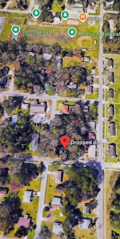 This is an aerial map view of a residential neighborhood with a dropped pin — XXXX S MOORE STREET, BUNNELL, FL