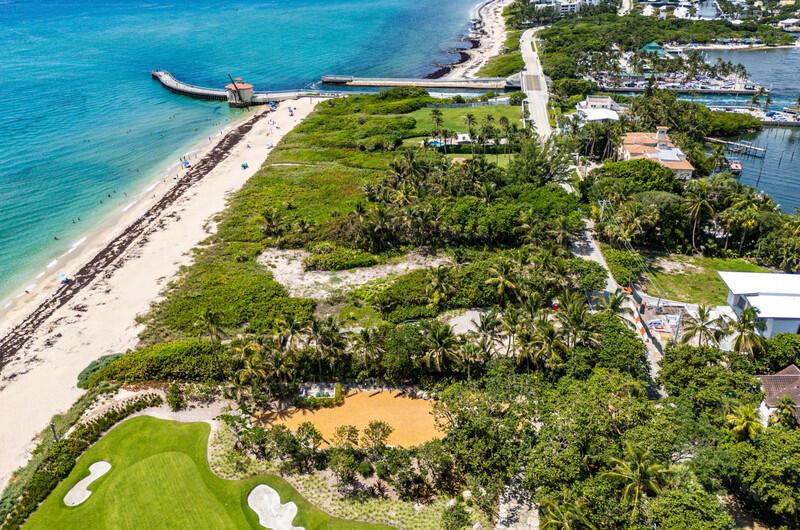 An aerial view shows a sandy beach, a pier, lush vegetation, and a golf course — 3060 S Ocean Boulevard, Lantana FL 33462, LANTANA, FL