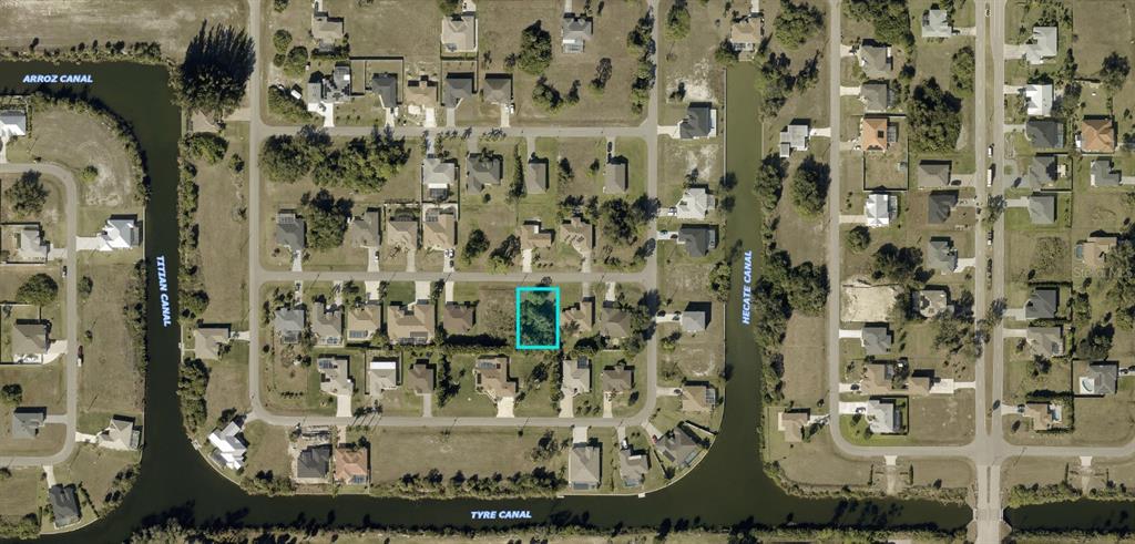 This is an aerial map showing a vacant residential lot highlighted in blue — 2908 NW 19TH STREET, CAPE CORAL, FL