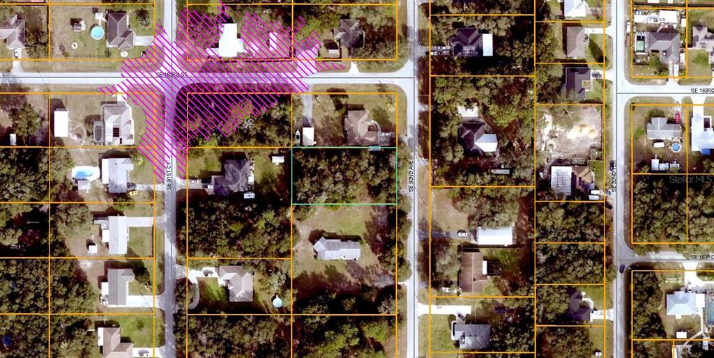 This is an aerial map showing residential lots and streets in a suburban neighborhood — SE 92ND AVENUE, SUMMERFIELD, FL