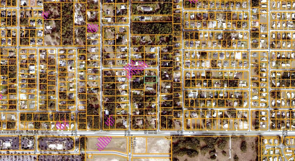 This is an aerial map showing residential lots and streets in a suburban neighborhood — SE 92ND AVENUE, SUMMERFIELD, FL