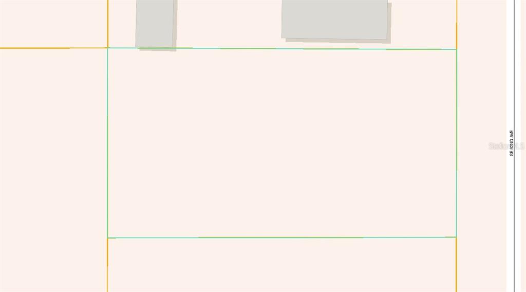 This is a map showing a rectangular property lot outlined in green — SE 92ND AVENUE, SUMMERFIELD, FL