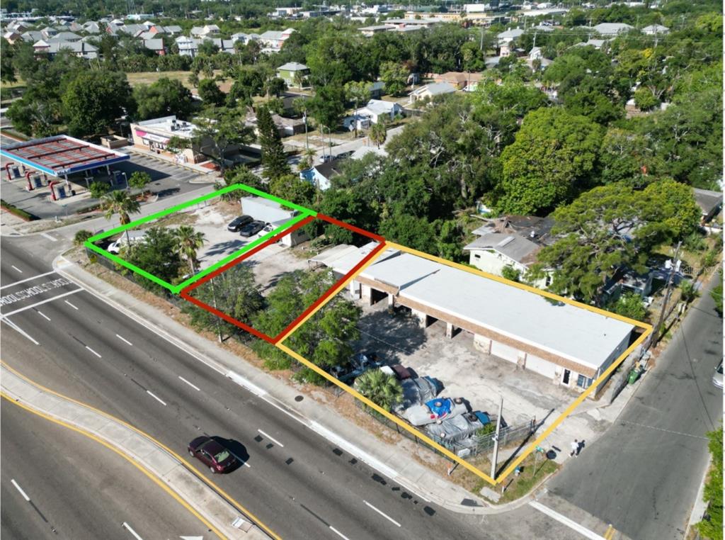 An aerial view shows three adjacent commercial lots with a building and paved parking areas — 1116 1ST STREET W, BRADENTON, FL