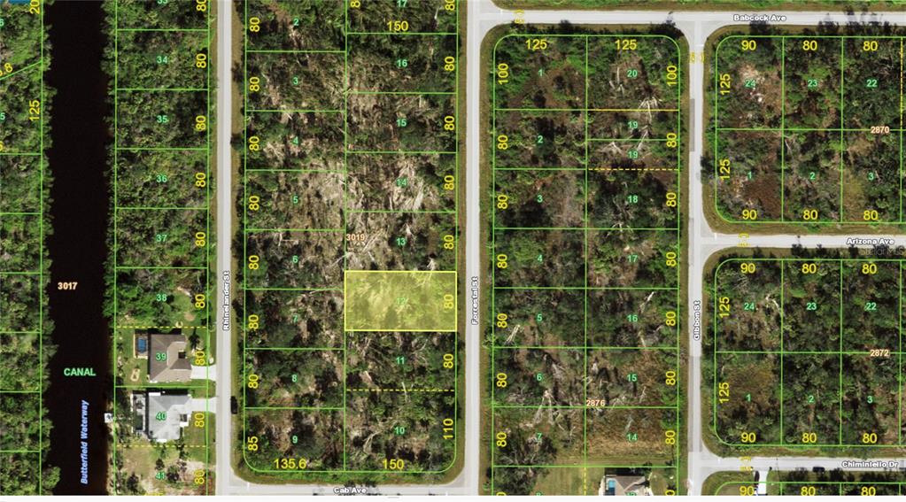 This is a map showing a highlighted vacant lot among other undeveloped residential parcels — 1071 FORRESTAL STREET, PORT CHARLOTTE, FL