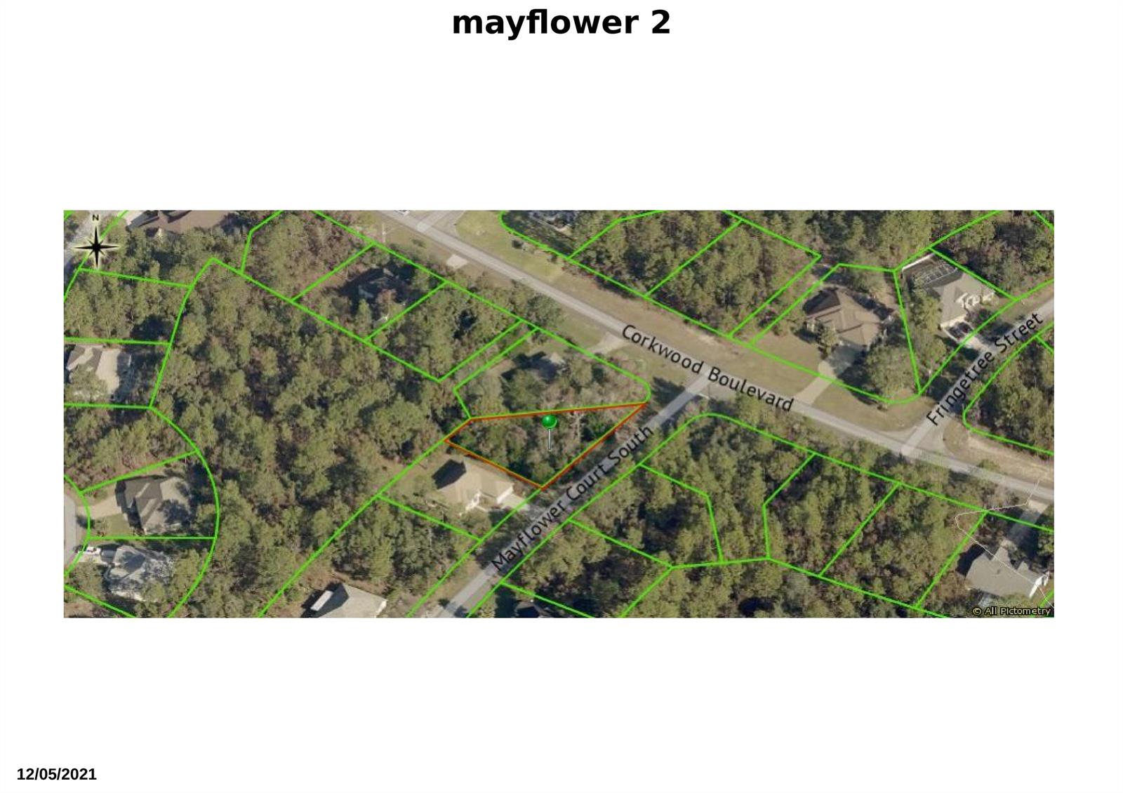 This is an aerial map showing a residential lot outlined in green at a street intersection — 2 Mayflower Court S, FL 34446, FL