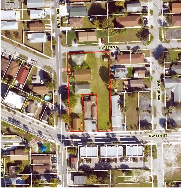 This is an aerial map showing a property outlined in red within a residential neighborhood — 516 NW 4th Ave, Hallandale Beach FL 33009, HALLANDALE BEACH, FL