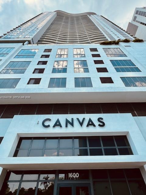 A low-angle view of the exterior of the high-rise Canvas building — 1600 NE 1 # 1915, Miami FL 33132, MIAMI, FL