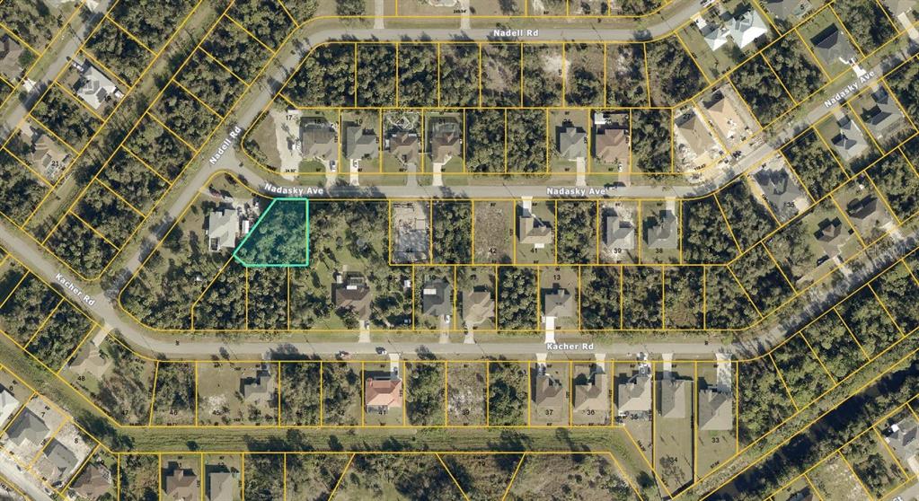 This is an aerial map view of a residential neighborhood with highlighted vacant land parcels — NADASKY LOT #47 AVENUE, NORTH PORT, FL