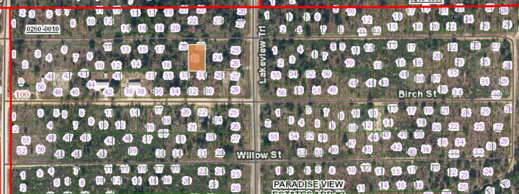 This is a satellite map view showing a grid of residential land parcels and streets — 000 Unassigned Location, FL 32148, FL