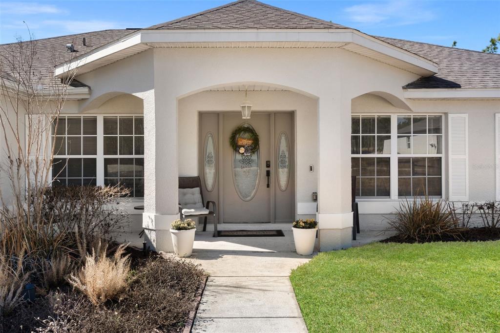 A kitchen with wood cabinets, a central island, and stainless steel appliances — 15335 FLEETWOOD ROAD, WEEKI WACHEE, FL