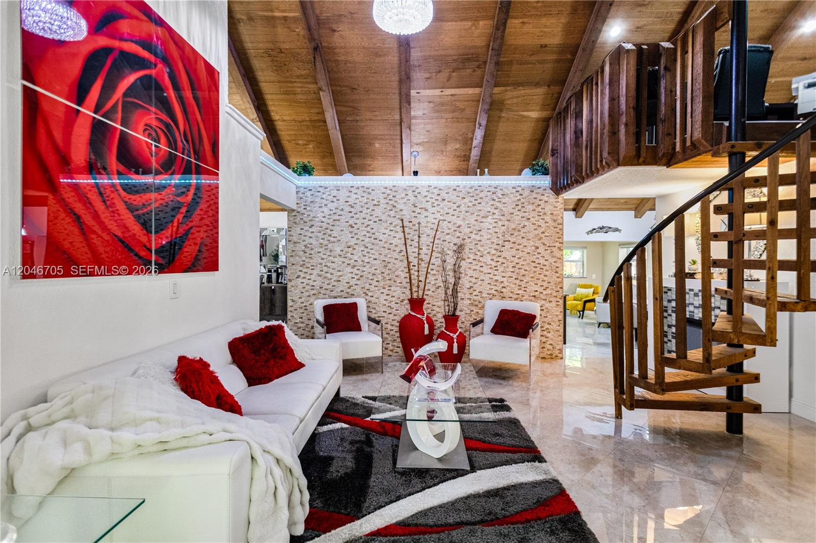 A living room features a vaulted wood ceiling, a spiral staircase, and red-accented decor — 2620 Buttonwood Ave, Miramar FL 33025, MIRAMAR, FL