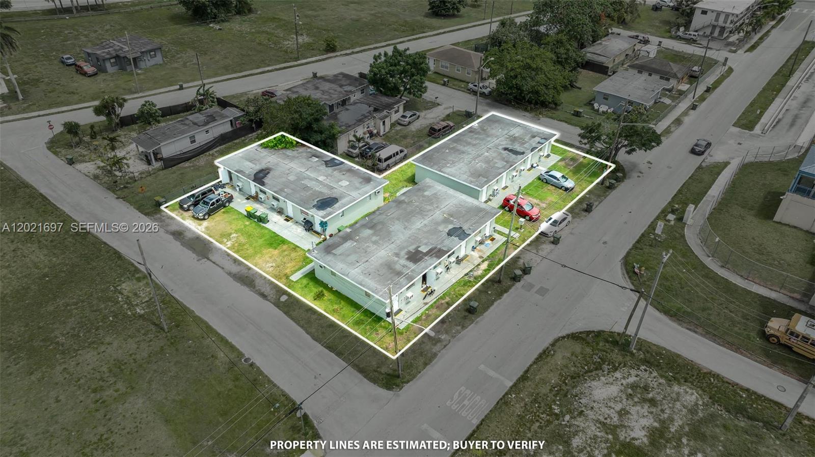 An aerial view shows three single-story residential buildings outlined on a corner lot — 651 SW 4th Ave, Homestead FL 33030, HOMESTEAD, FL
