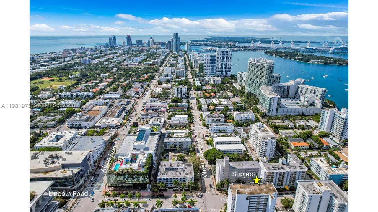 This aerial view shows a multi-story residential building marked with a star in Miami — 1300 Lincoln Rd # 1B, Miami Beach FL 33139, MIAMI BEACH, FL