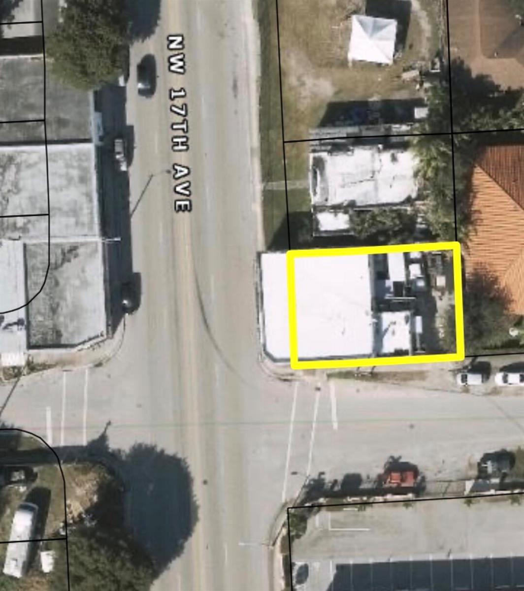 An aerial view of a commercial building highlighted in yellow along a city street — 4201 NW 17th Avenue, Miami FL 33142, MIAMI, FL