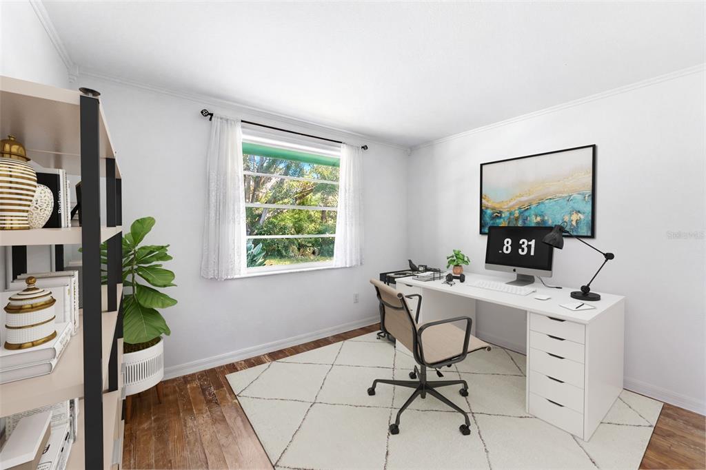 A home office features a white desk, a rolling chair, and a window with curtains — 12614 LOGAN PLACE, TAMPA, FL
