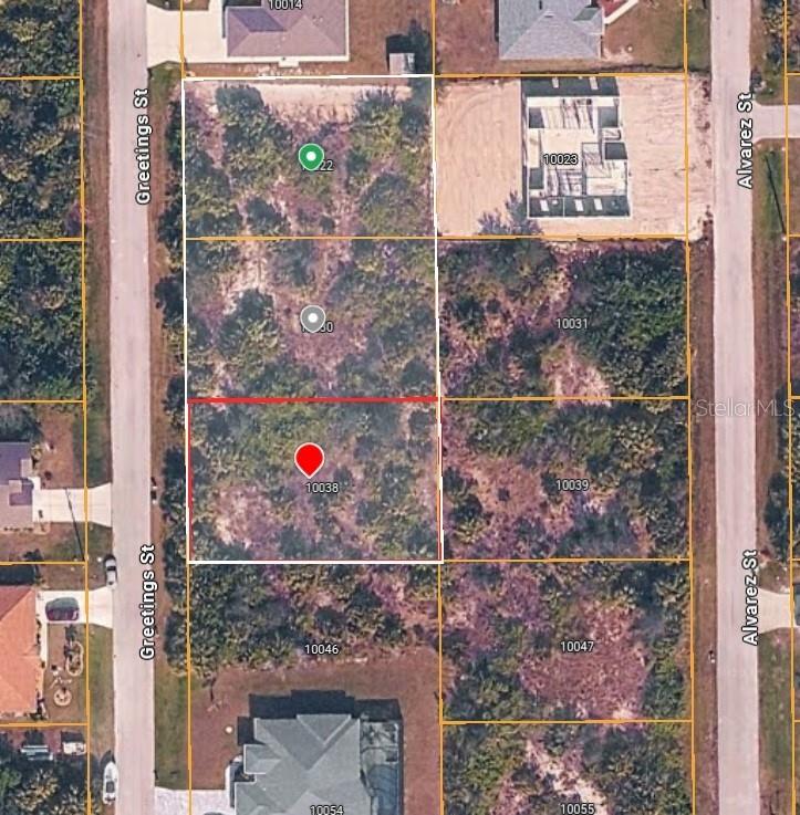 This aerial map shows three adjacent vacant residential lots situated between two paved streets — 10038 GREETINGS STREET, PORT CHARLOTTE, FL