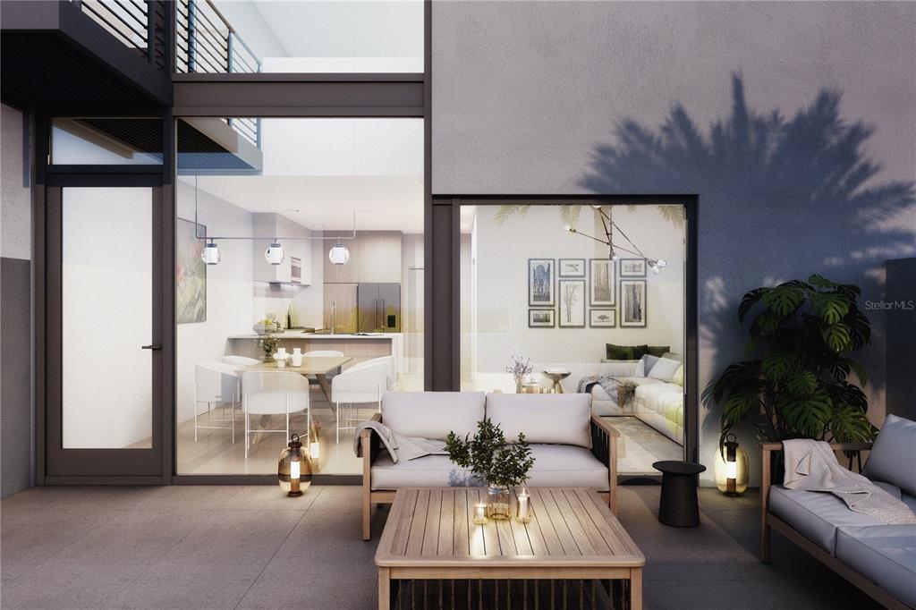 This architectural rendering shows a modern patio with outdoor furniture overlooking an interior living space — 2170 ROBINHOOD STREET UNIT C2-102, SARASOTA, FL