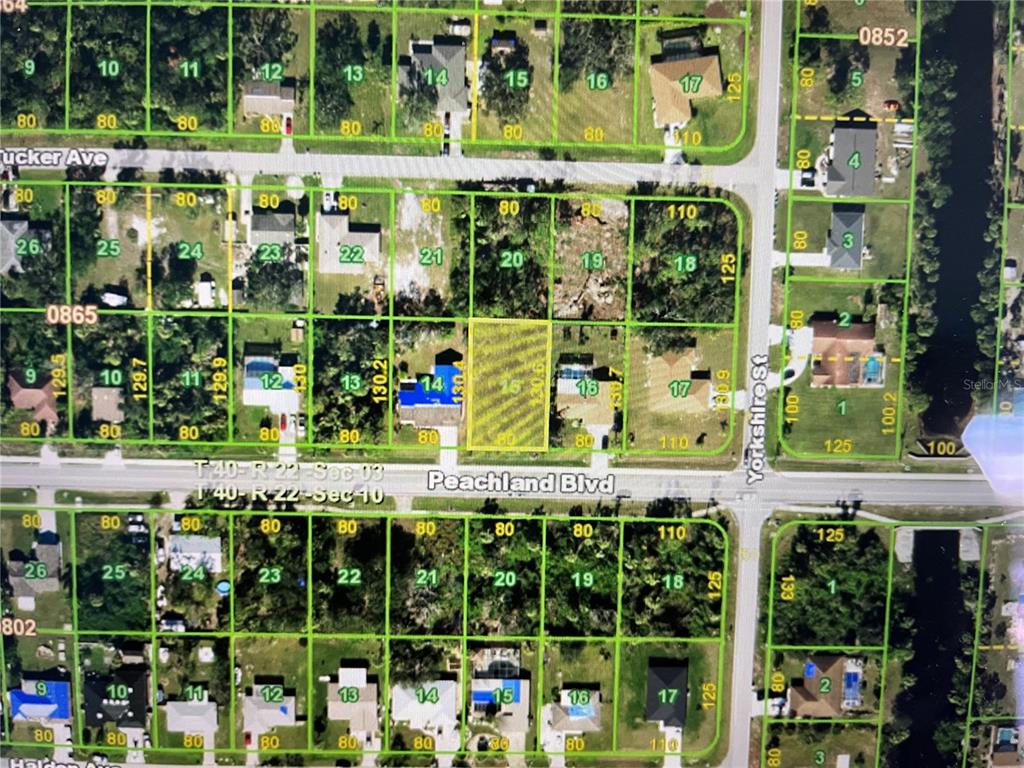 This is a satellite map showing residential lots and street layouts — 21086 PEACHLAND BOULEVARD, PORT CHARLOTTE, FL