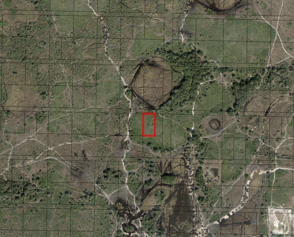 An aerial map view shows a rectangular plot of land highlighted in red — 0 NW 310th Street, Okeechobee FL 34972, OKEECHOBEE, FL