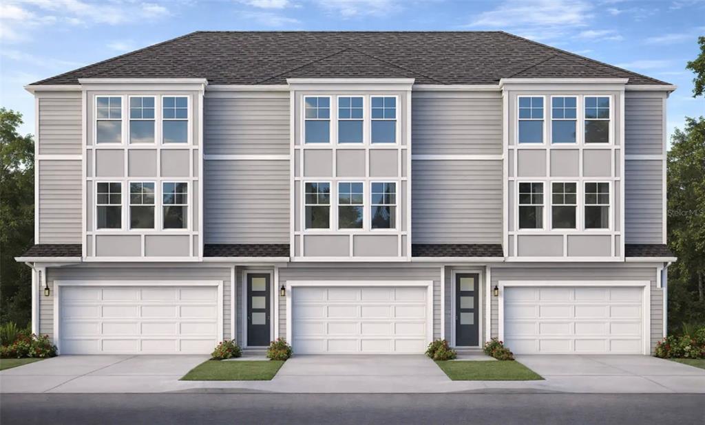 This is a rendering of a three-unit gray townhouse building with attached garages — 3208 N TAMPA STREET, TAMPA, FL