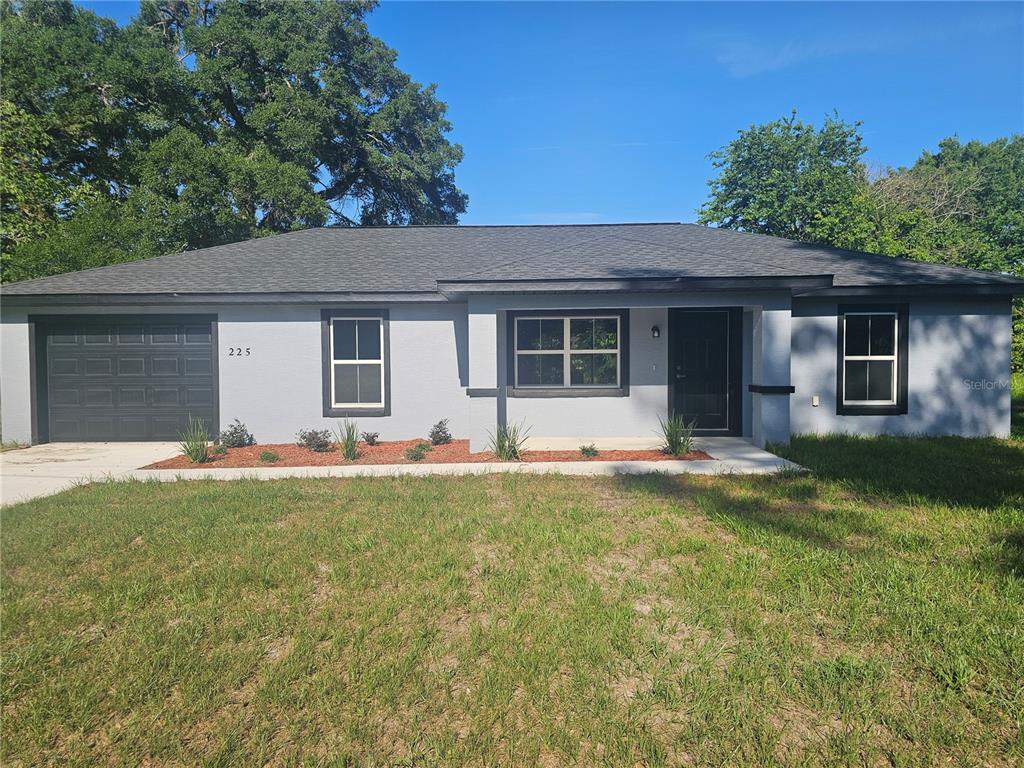 225 NW 16TH COURT