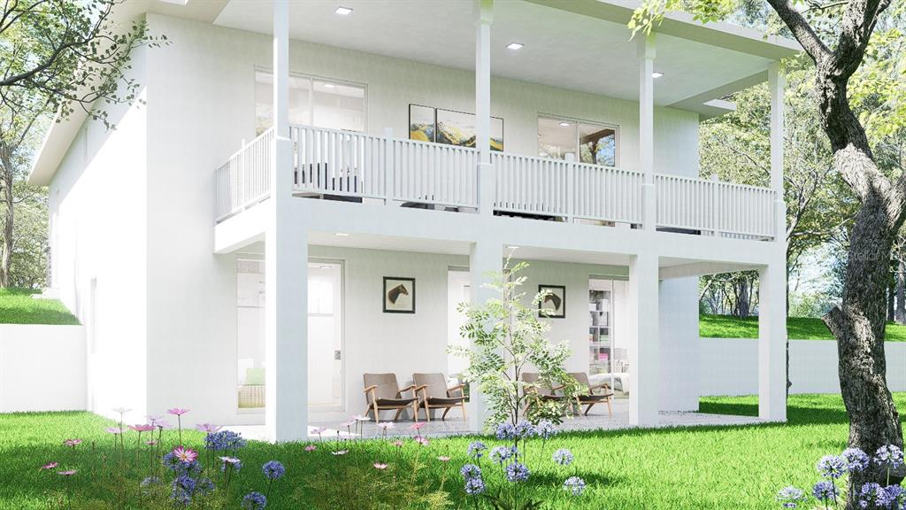 This is a rendering of the exterior of a two-story house with a covered patio — 537 PINELOCH DRIVE, HAINES CITY, FL