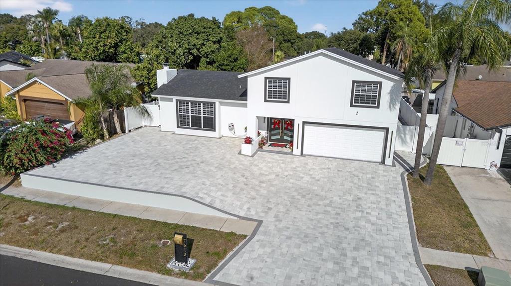 7613 RUSTIC DR, TAMPA, FL — photo 2 of 30