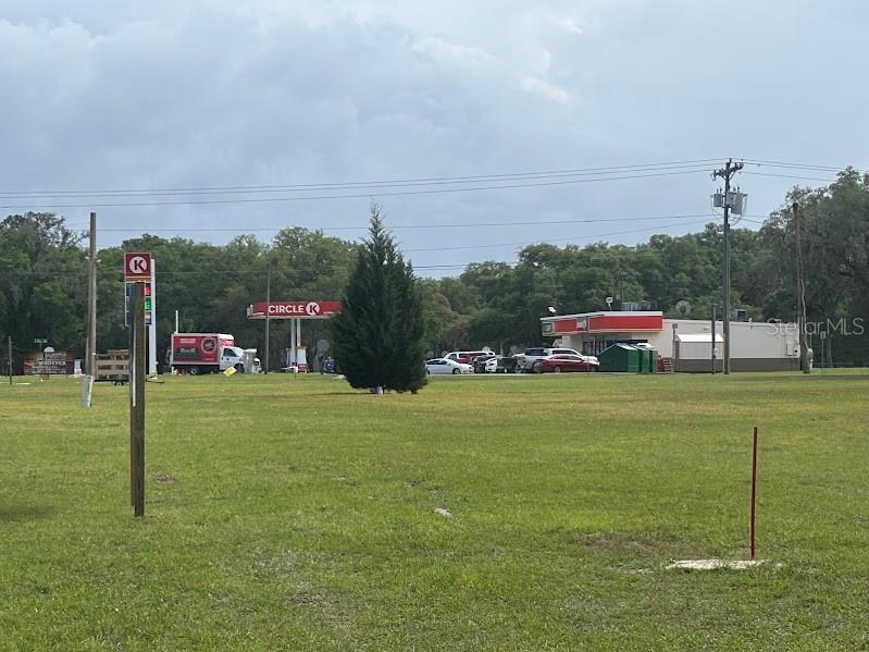 A grassy lot sits in front of a Circle K gas station and convenience store — 11471 E HIGHWAY 316, FORT MC COY, FL