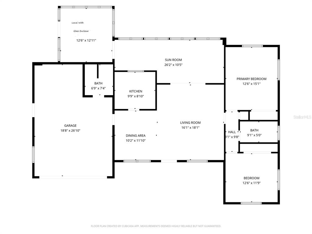 This is a floor plan showing the layout of a house with a garage and sunroom — 1735 LORALIN DRIVE, ENGLEWOOD, FL