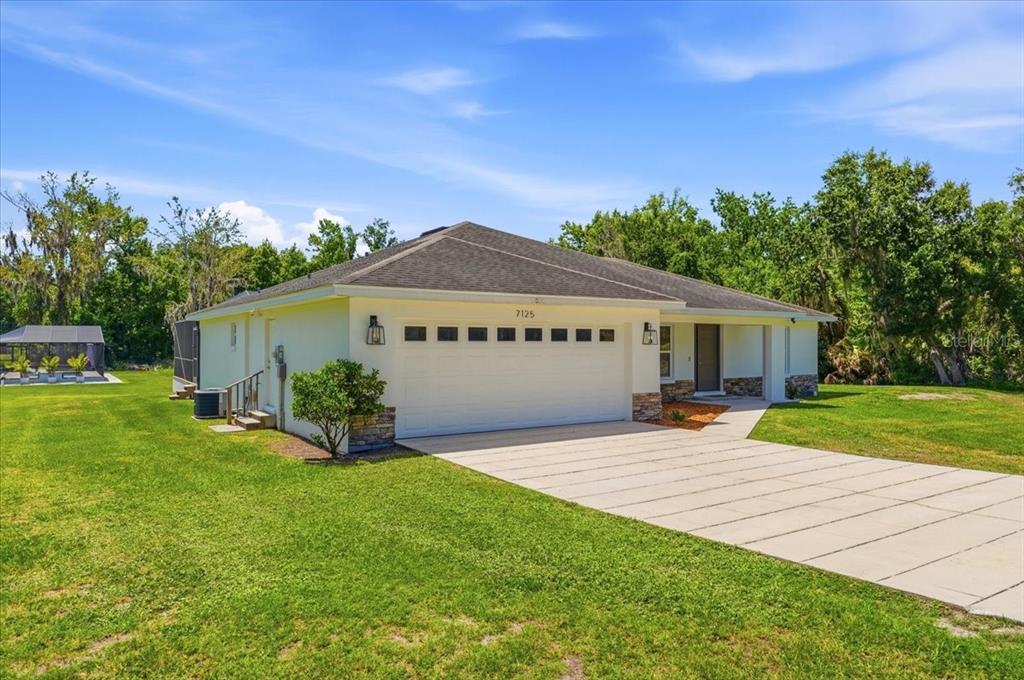 7125 HONEYSUCKLE DRIVE