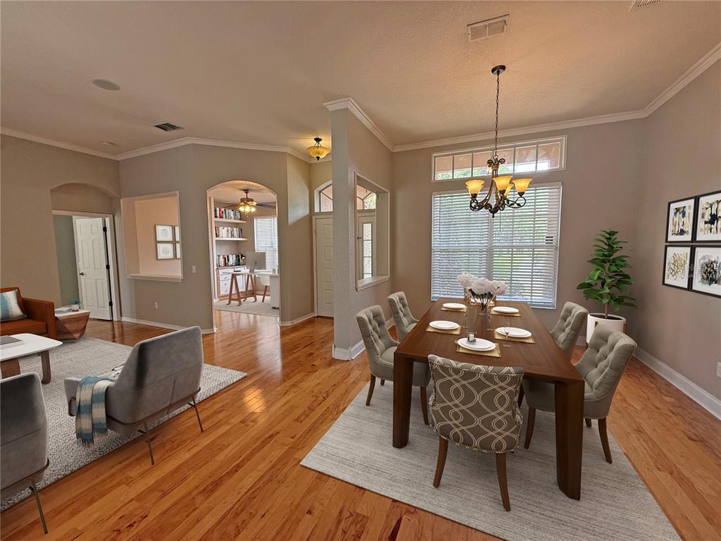 A dining room with a wooden table and chairs sits adjacent to a living area — 3045 SUTTON WOODS DRIVE, PLANT CITY, FL