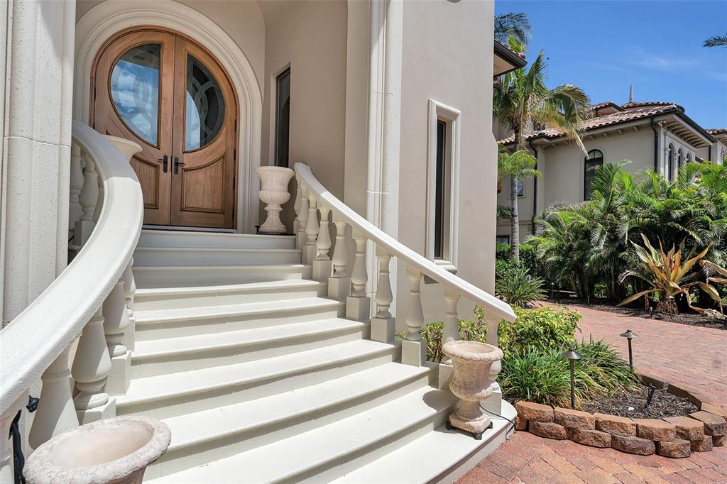 An aerial view of a waterfront mansion featuring a swimming pool and a private dock — 1372 HARBOR DRIVE, SARASOTA, FL