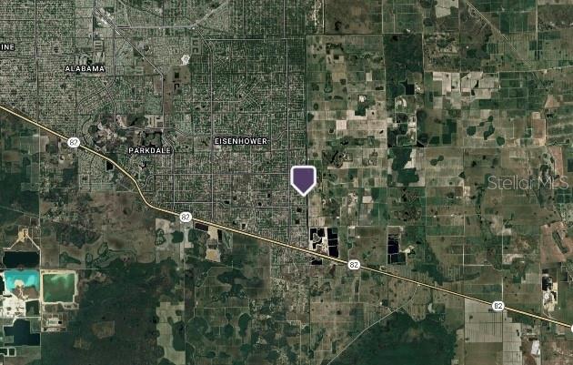 This is a satellite map showing a residential area located near State Road 82 — 1251 ECHARD STREET E, LEHIGH ACRES, FL