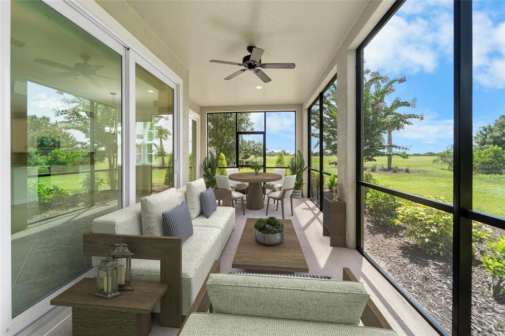 A screened-in patio with outdoor furniture, a ceiling fan, and views of a grassy field — 7342 DIVOT LOOP UNIT 1, LAKEWOOD RANCH, FL