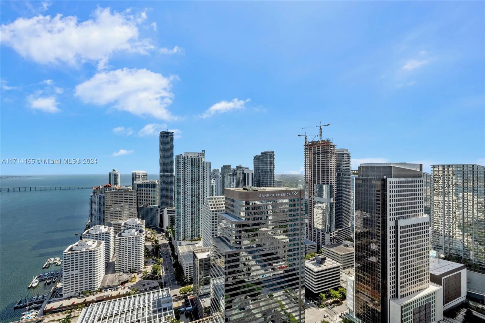 An elevated view of the Miami skyline featuring numerous skyscrapers and a waterfront marina — 495 Brickell Ave # 4805, Miami FL 33131, MIAMI, FL