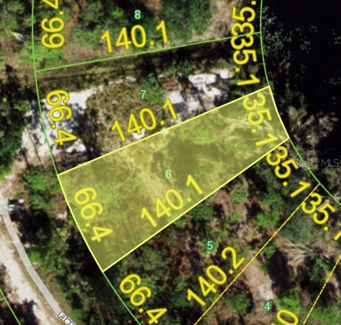 This is a satellite map view showing the property boundaries and dimensions of a land parcel — 12516 FIESTA CIRCLE, PUNTA GORDA, FL