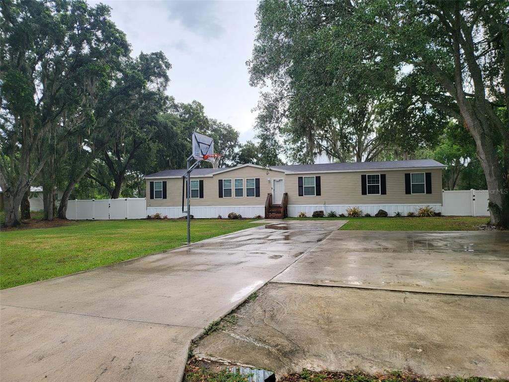 8915 HAMMOCK LOOP, POLK CITY, FL 33868