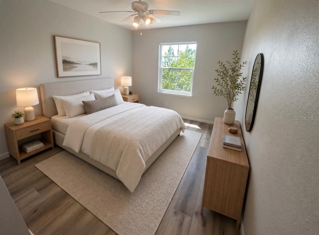 A bedroom features a bed with light bedding, two nightstands, a dresser, and a window — 1810 E PALM AVENUE UNIT 1210, TAMPA, FL